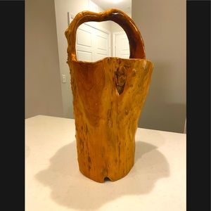 Faux wood trunk basket